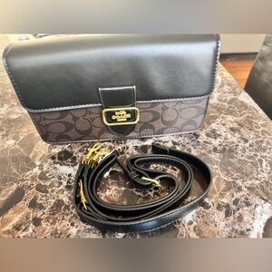 Coach Black and Brown Clutch with Red Bow